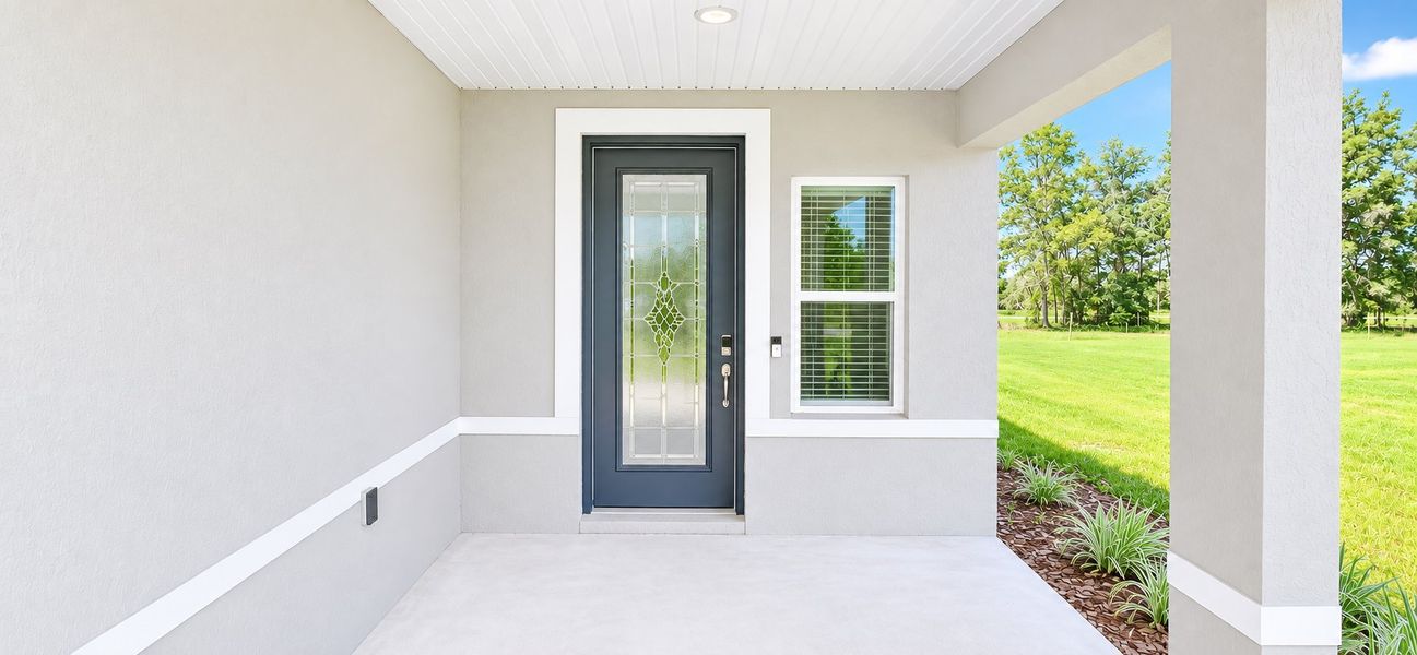 Exterior details and patio area of a home in Marion Oaks, Ocala (Image 3). Exterior details and patio area of a home in Marion Oaks, Ocala (Image 3).
