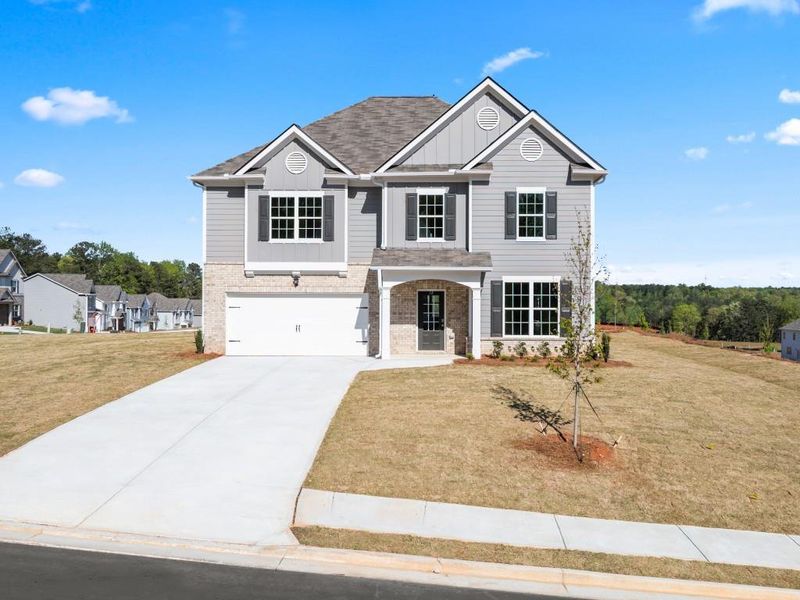 Front exterior of a new home in Thompson Ridge, Dallas, GA, highlighting curb appeal (Image 22).