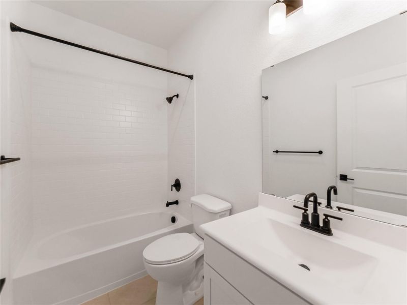 Furnished interior view inside a new home in Oakberry Trails, Waller (Image 5).