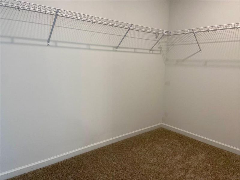 Spacious, unfurnished interior of a new home in Eastlyn Crossing, Flowery Branch (Image 28).