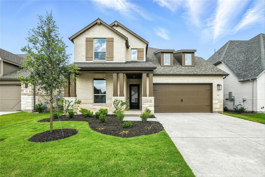Front exterior of a new home in Wildflower Ranch: 50ft. lots, Dish, TX, highlighting curb appeal (Image 16). Front exterior of a new home in Wildflower Ranch: 50ft. lots, Dish, TX, highlighting curb appeal (Image 16).