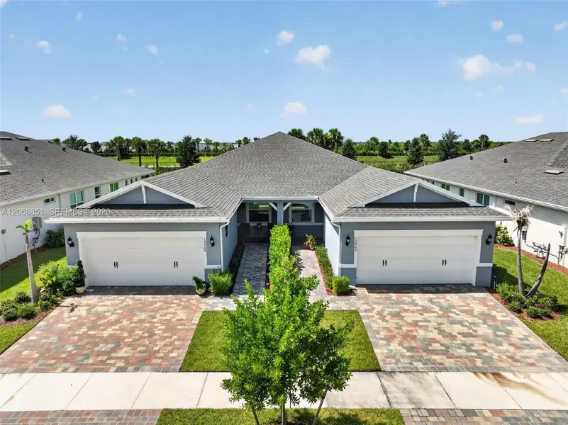 Front exterior of a new home in , Port St. Lucie, FL, highlighting curb appeal (Image 28).
