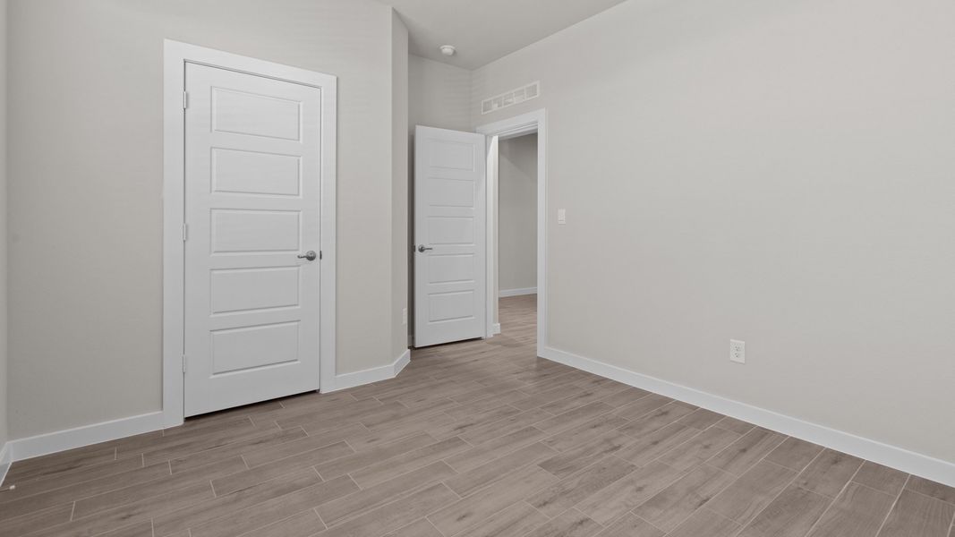 Representative unfurnished interior of a home built from the BLANCO by D.R. Horton in Northwest Passage, Midland (Image 21). Representative unfurnished interior of a home built from the BLANCO by D.R. Horton in Northwest Passage, Midland (Image 21).