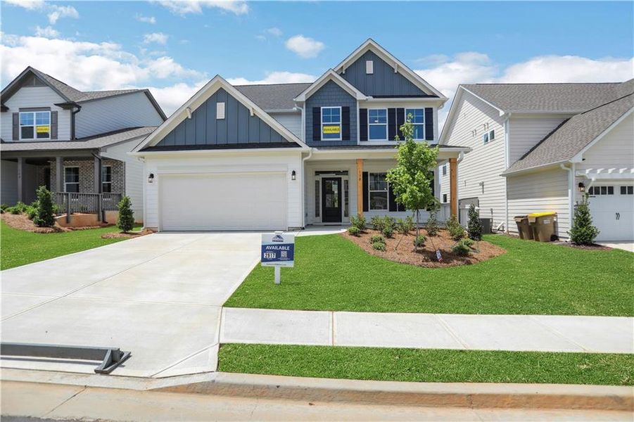Front exterior of a new home in Twin Lakes, Hoschton, GA, highlighting curb appeal (Image 2).