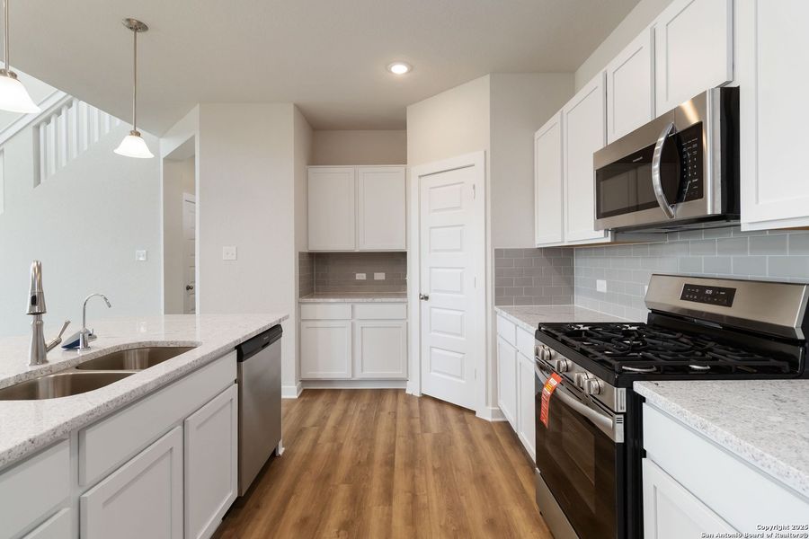 Furnished interior view inside a new home in Hickory Ridge, Elmendorf (Image 9).