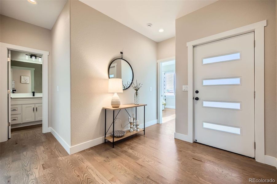 A spacious foyer greets you as you step inside. (Staged foyer from 1204 N Picketwire Lane, which is also for sale.  It's the same layout, with a different exterior, floor colors and some different finishes. Check them both out and choose which one you'd like to purchase!)