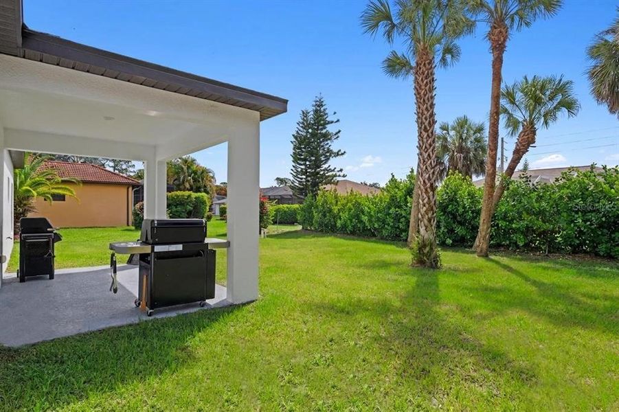 Exterior details and patio area of a home in , North Port (Image 23).
