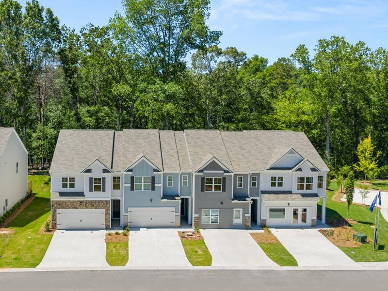 Front exterior of a new home in Falcon Landing Townhomes, Gainesville, GA, highlighting curb appeal (Image 18). Front exterior of a new home in Falcon Landing Townhomes, Gainesville, GA, highlighting curb appeal (Image 18).