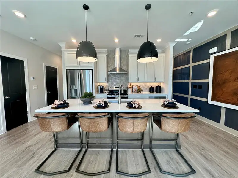 Furnished interior view inside a new home in Market Square at Sawnee Village, Cumming (Image 9).