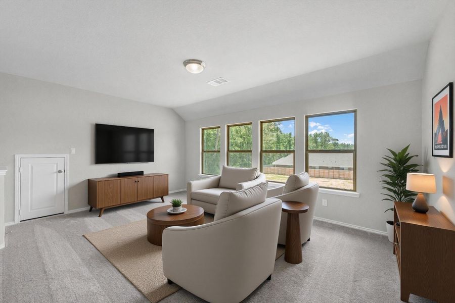 The upstairs game room is perfect for entertaining or play!