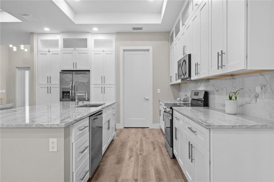 Furnished interior view inside a new home in , Port Charlotte (Image 11). Furnished interior view inside a new home in , Port Charlotte (Image 11).