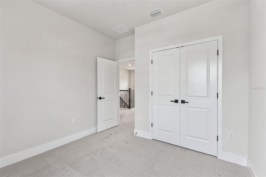 Spacious, unfurnished interior of a new home in Emerald Landing at Waterside at Lakewood Ranch – Cottage Series, Sarasota (Image 32).