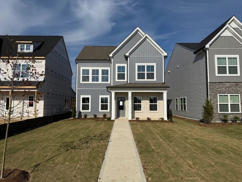 Exterior  - Earthy textures and warm tones feel rooted in place.