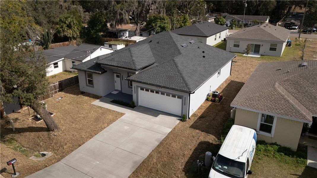 Front exterior of a new home in , Apopka, FL, highlighting curb appeal (Image 18).