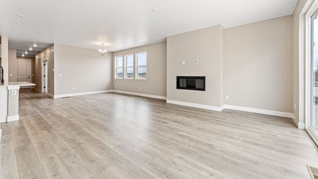 Representative unfurnished interior of a home built from the Pike by Taylor Morrison in The Aurora Highlands Town Collection, Aurora (Image 21).