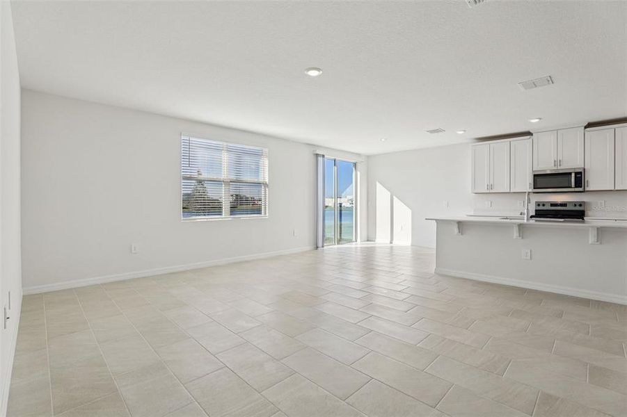 Spacious, unfurnished interior of a new home in Lake Deer Estates - Signature Series, Poinciana (Image 30).
