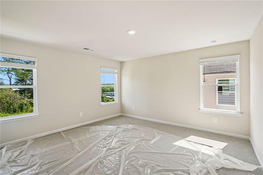 Spacious, unfurnished interior of a new home in Hawthorne Station, College Park (Image 21).