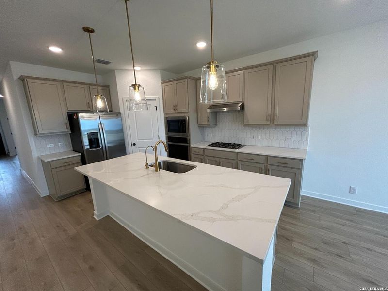 Furnished interior view inside a new home in Hennersby Hollow, San Antonio (Image 10).