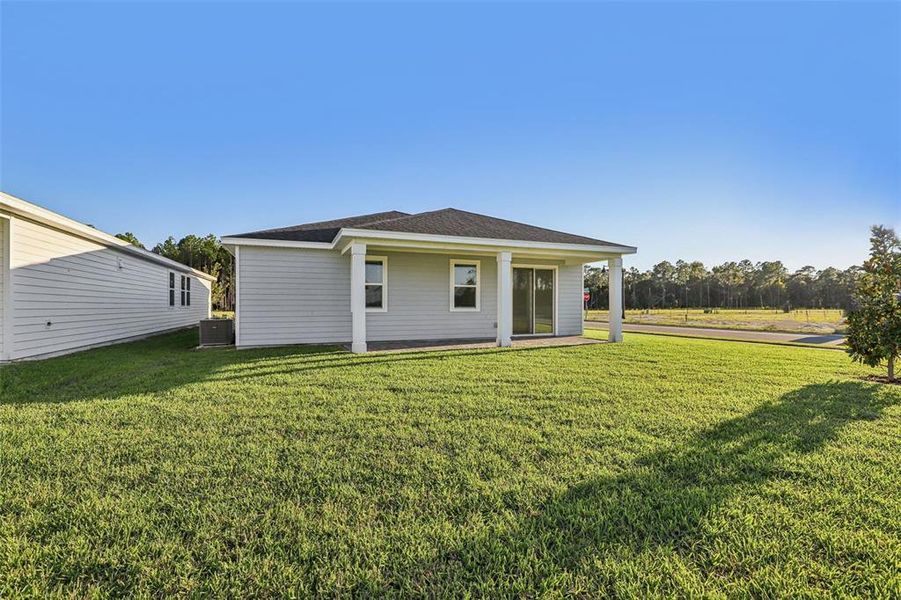 Exterior details and patio area of a home in Colbert Landings, Palm Coast (Image 18).