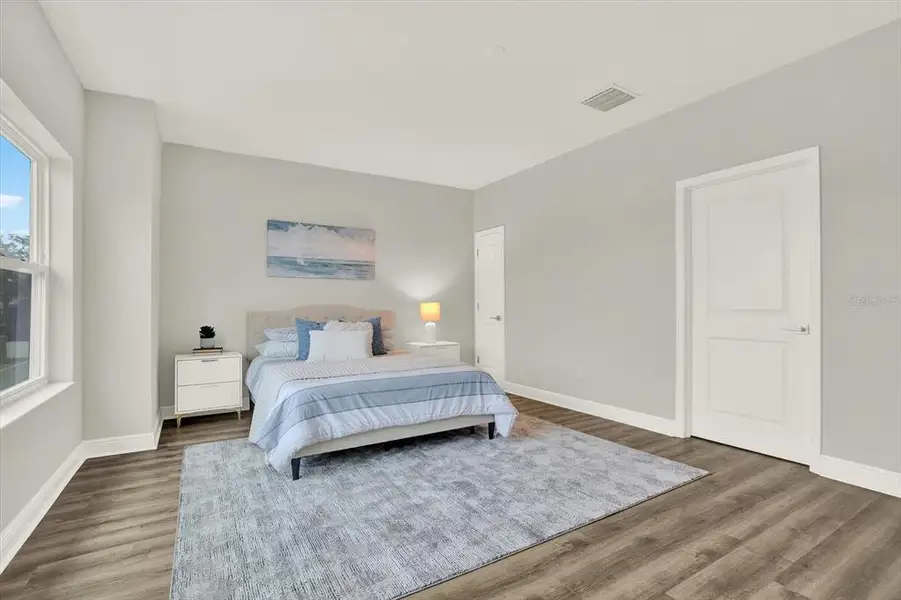 Furnished interior view inside a new home in The Towns At Long Bayou, Seminole (Image 7).