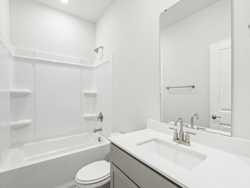 Secondary bathroom in the Chandler floorplan at 253 White Birch Lane in Angier, NC.