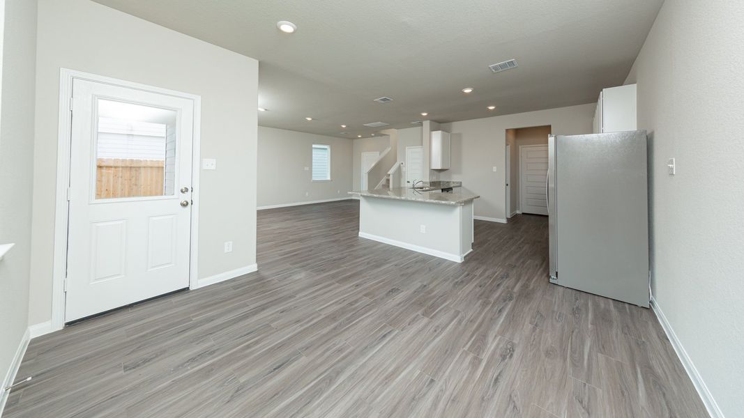 Dining Area to Kitchen and Family Room