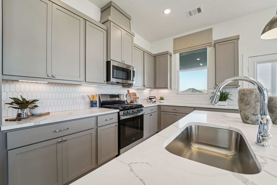 Furnished interior view inside a new home in Bridgeland, Cypress (Image 11).