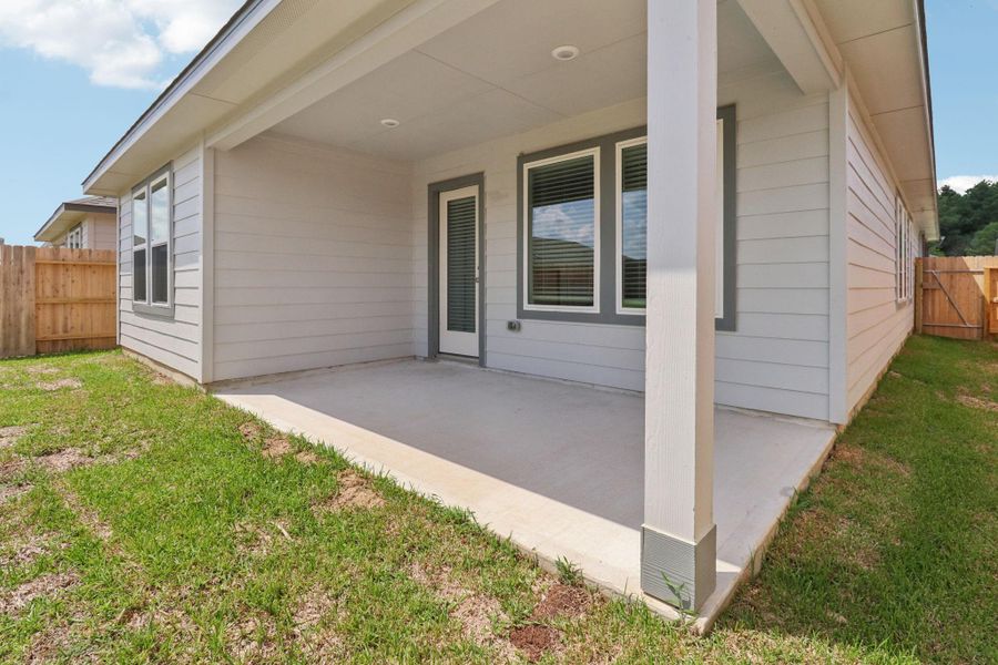 Front exterior of a new home in Landing Meadows - Traditional Series, New Caney, TX, highlighting curb appeal (Image 21). Front exterior of a new home in Landing Meadows - Traditional Series, New Caney, TX, highlighting curb appeal (Image 21).