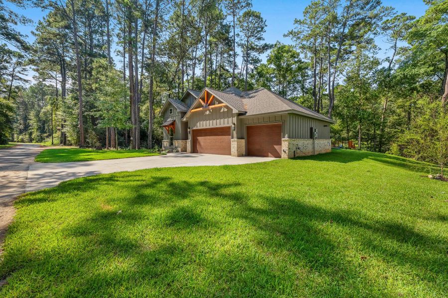 Front exterior of a new home in , Livingston, TX, highlighting curb appeal (Image 17).