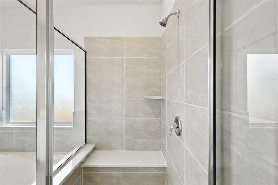 Full bathroom featuring a stall shower