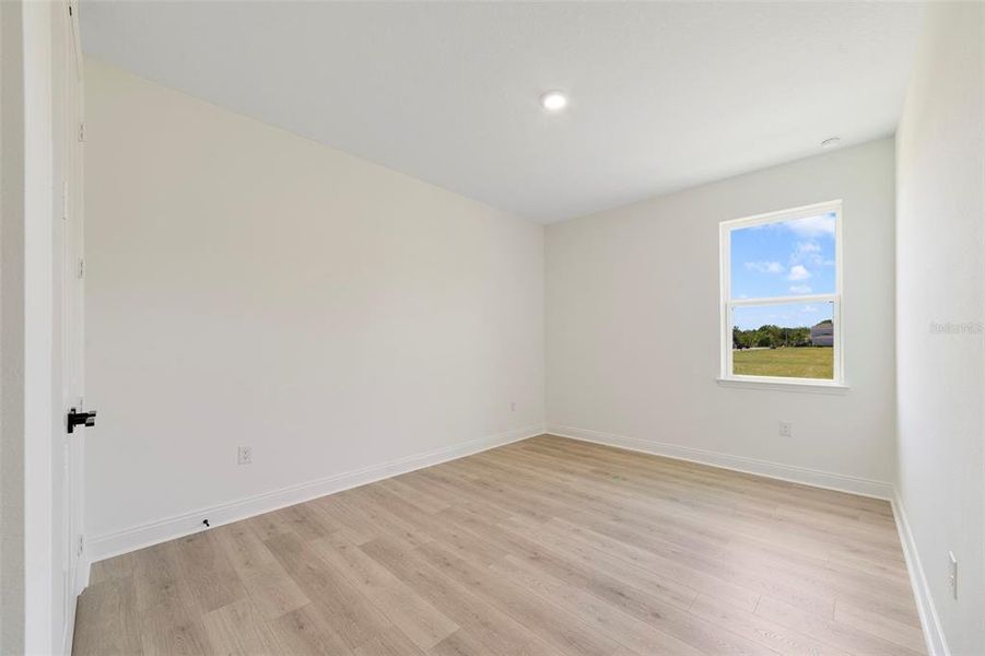 Spacious, unfurnished interior of a new home in Estates at Lake Jesup, Sanford (Image 17).