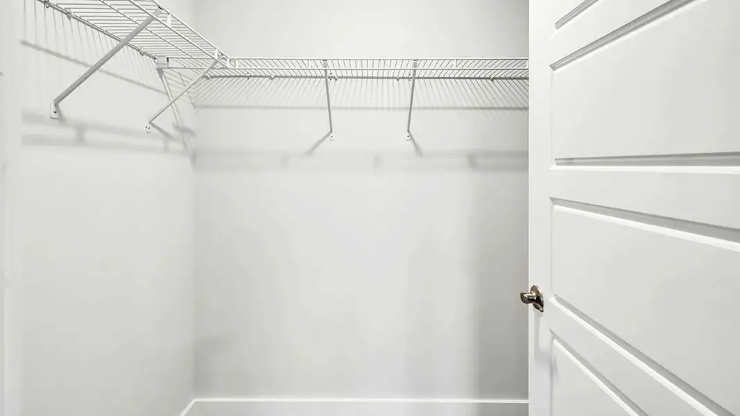Spacious, unfurnished interior of a new home in The Townes at Cedar Hill Landing, Navassa (Image 21).