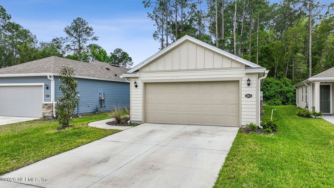 Front exterior of a new home in , Green Cove Springs, FL, highlighting curb appeal (Image 25).