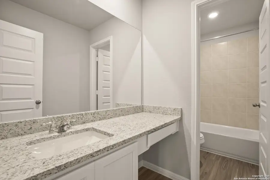 Furnished interior view inside a new home in Cinco Lakes, San Antonio (Image 8).