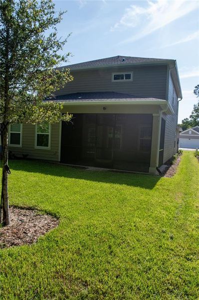 Front exterior of a new home in , Gainesville, FL, highlighting curb appeal (Image 2).