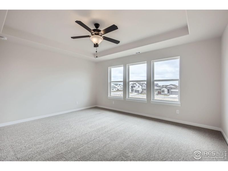 Spacious, unfurnished interior of a new home in RainDance, Windsor (Image 19).