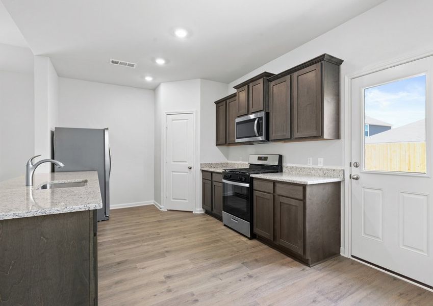 The kitchen of the Reed has sprawling granite countertops. The kitchen of the Reed has sprawling granite countertops.