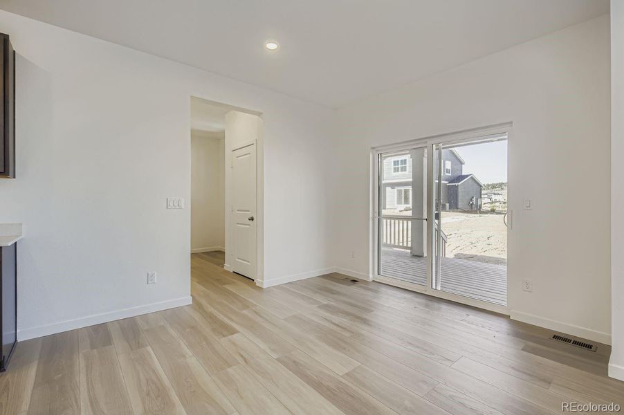 Spacious, unfurnished interior of a new home in Riano Ridge: The Monarch Collection, Loveland (Image 10).