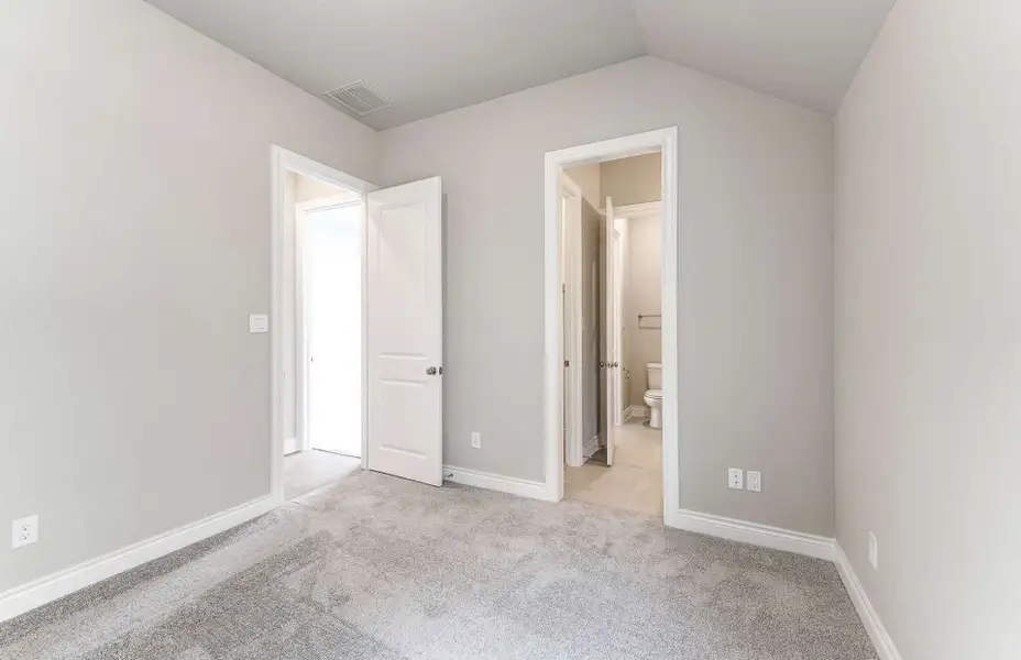 Representative unfurnished interior of a home built from the 2909 by Ravenna Homes in The Woodlands Hills 65′, Willis (Image 33). Representative unfurnished interior of a home built from the 2909 by Ravenna Homes in The Woodlands Hills 65′, Willis (Image 33).