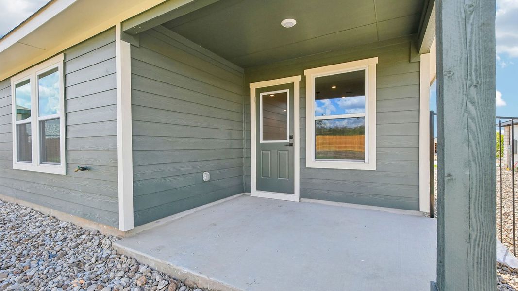 Exterior details and patio area of a home in Trails at Wildhorse, Austin (Image 3).