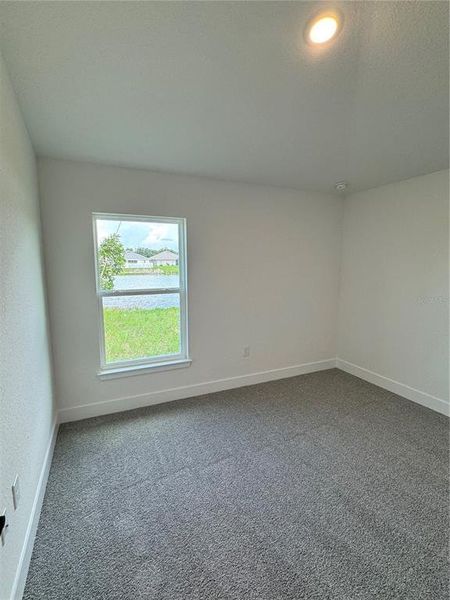 Spacious, unfurnished interior of a new home in Watercress Cove, North Port (Image 7).