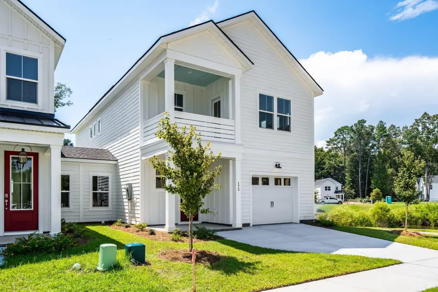 Front exterior of a new home in , Charleston, SC, highlighting curb appeal (Image 1). Front exterior of a new home in , Charleston, SC, highlighting curb appeal (Image 1).