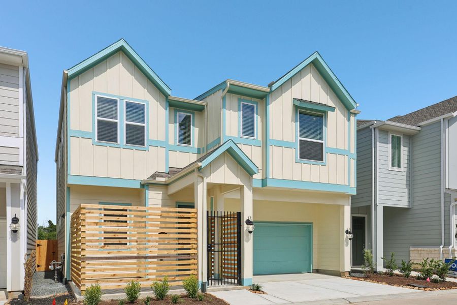 Front exterior of a new home in Kemah Crossing - Luxe Series, Kemah, TX, highlighting curb appeal (Image 25).