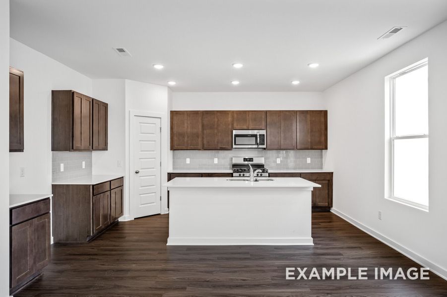 Representative furnished interior of a home built from the The Logan A by Davidson Homes LLC in Woods Crossing, Gallatin (Image 7).