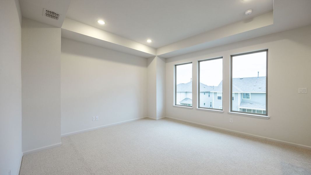 Spacious, unfurnished interior of a new home in Lariat 45', Liberty Hill (Image 8).