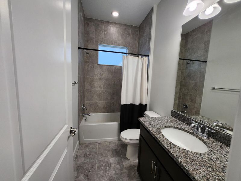 Furnished interior view inside a new home in , The Acreage (Image 9).