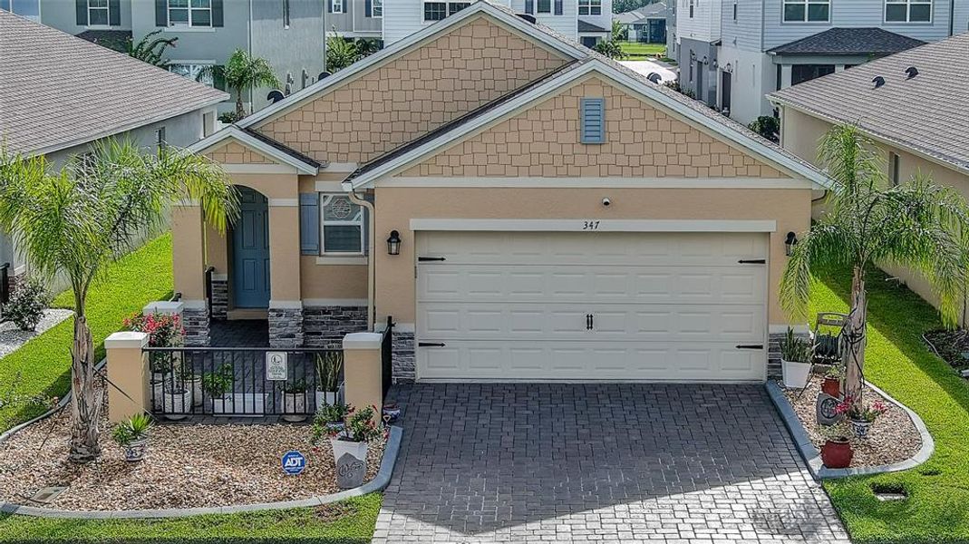 Front exterior of a new home in , New Smyrna Beach, FL, highlighting curb appeal (Image 22).