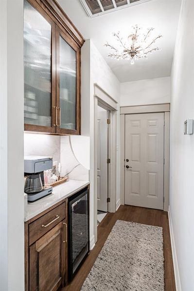 Coffee bar area and the hall to the garage and laundry room