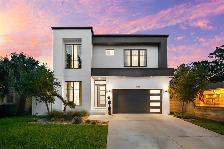 Front exterior of a new home in , Tampa, FL, highlighting curb appeal (Image 1).