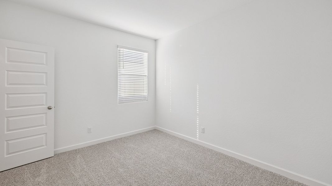 Spacious, unfurnished interior of a new home in Desert Moon Estates, Buckeye (Image 22).